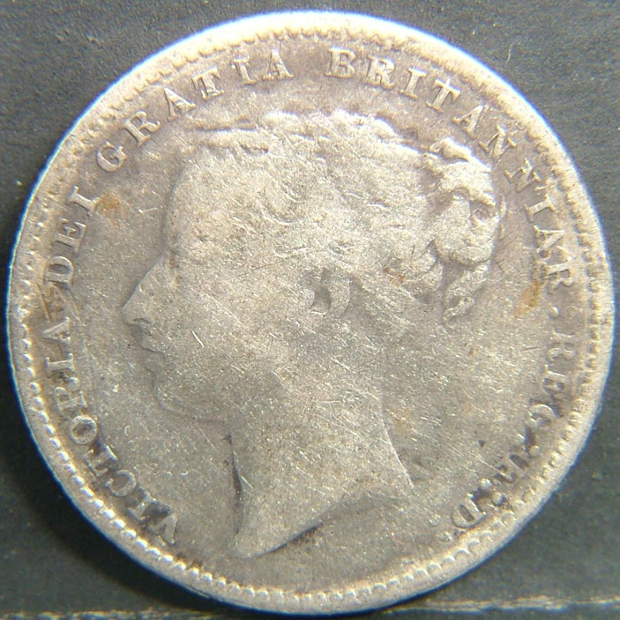 Back side of 🇬🇧 United Kingdom – Monarchs and Milestones 1 Shilling 1885 coin