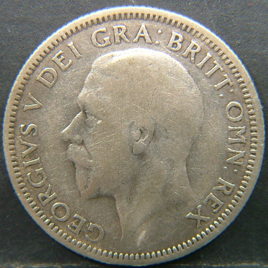 Back side of 🇬🇧 United Kingdom – Monarchs and Milestones 1 Shilling 1931 coin