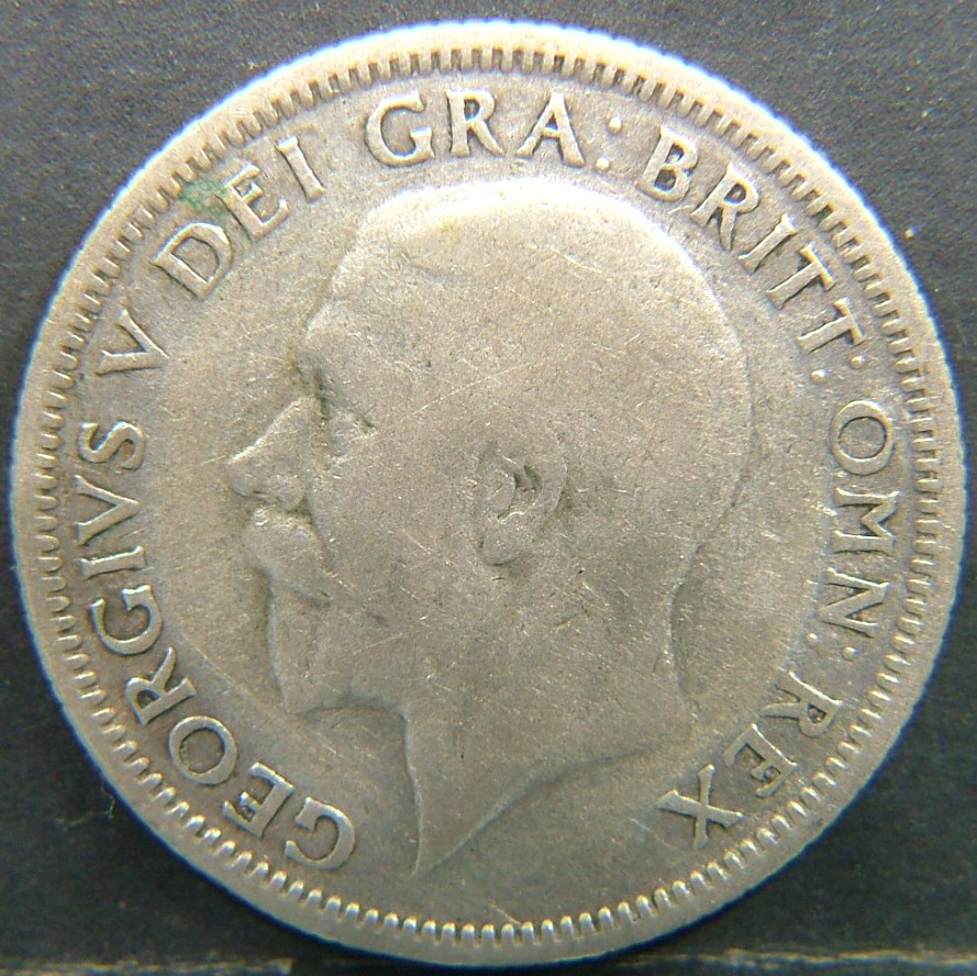 Back side of 🇬🇧 United Kingdom – Monarchs and Milestones 1 Shilling 1933 coin