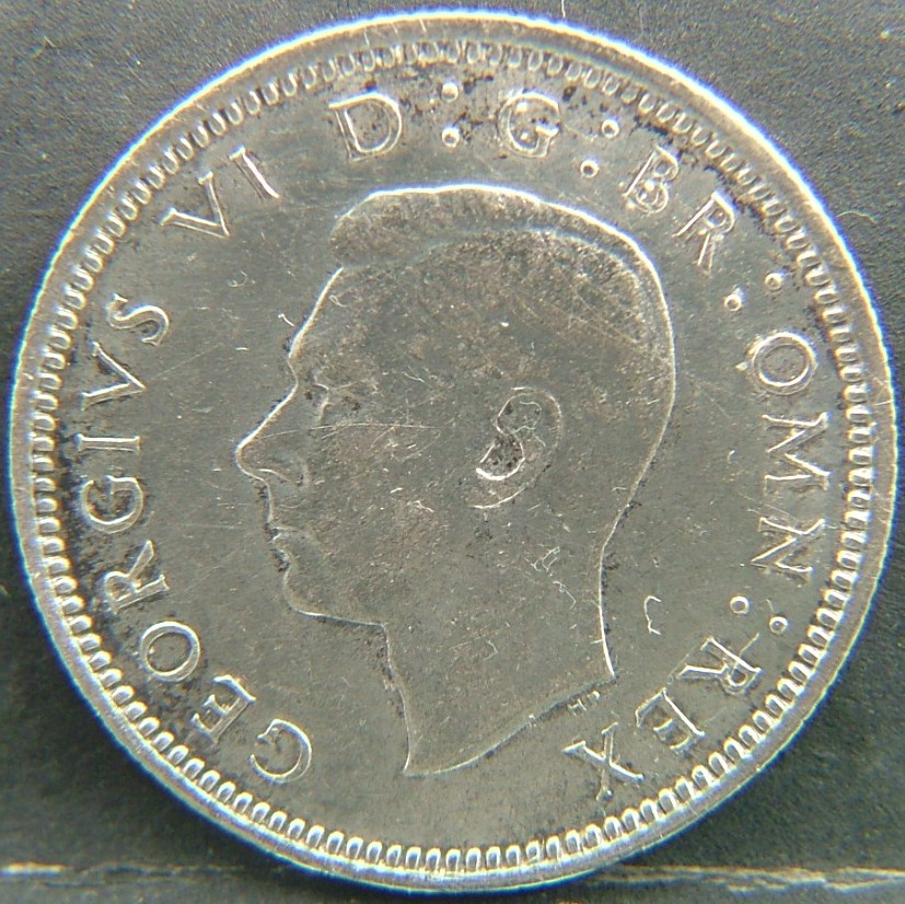 Back side of 🇬🇧 United Kingdom – Monarchs and Milestones 6 Pence 1940 coin