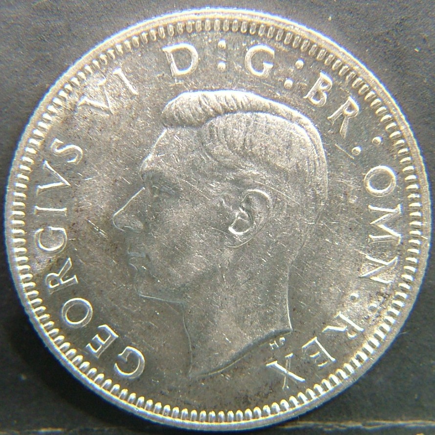 Back side of 🇬🇧 United Kingdom – Monarchs and Milestones 1 Shilling Eng 1944 coin