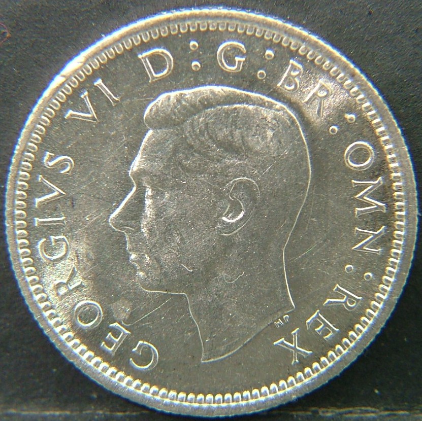 Back side of 🇬🇧 United Kingdom – Monarchs and Milestones 6 Pence 1945 coin