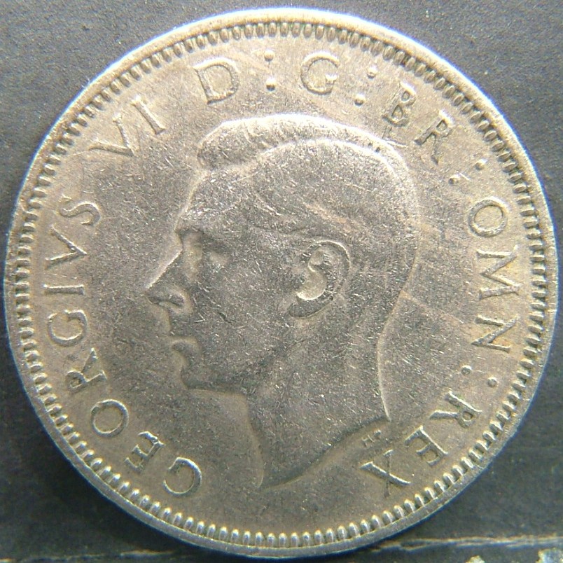 Back side of 🇬🇧 United Kingdom – Monarchs and Milestones 1 Shilling Eng 1947 coin