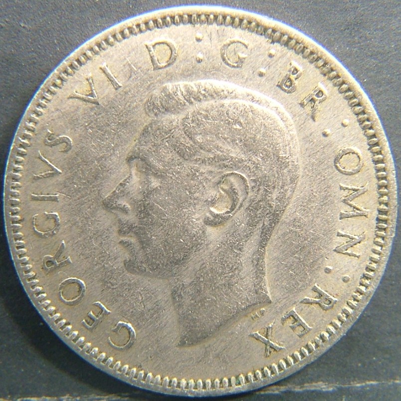 Back side of 🇬🇧 United Kingdom – Monarchs and Milestones 1 Shilling Eng 1948 coin