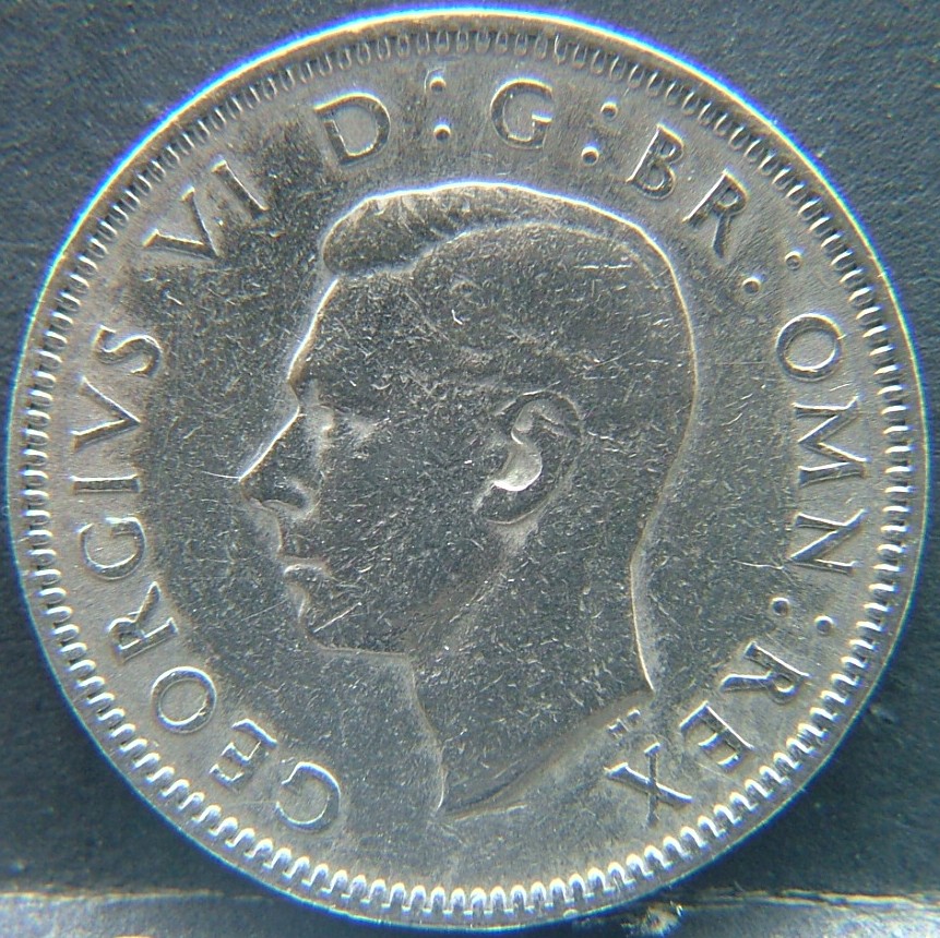 Front side of 🇬🇧 United Kingdom – Monarchs and Milestones 1 Shilling Eng 1948 coin