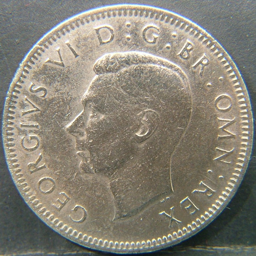Back side of 🇬🇧 United Kingdom – Monarchs and Milestones 1 Shilling Eng 1948 coin