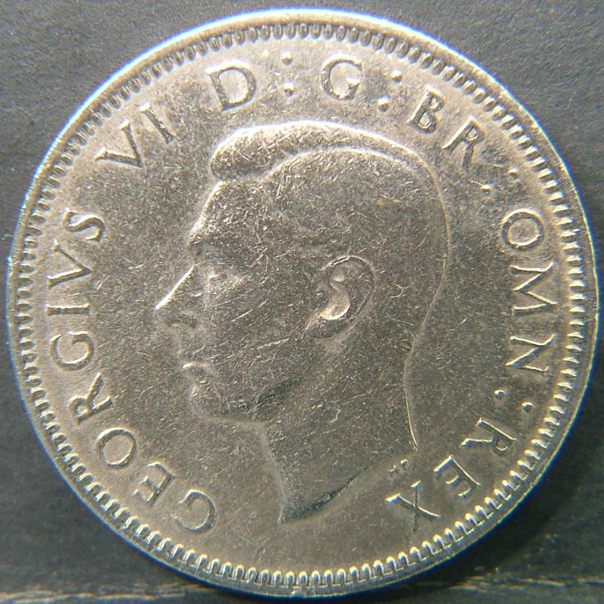 Back side of 🇬🇧 United Kingdom – Monarchs and Milestones 1 Shilling Eng 1948 coin