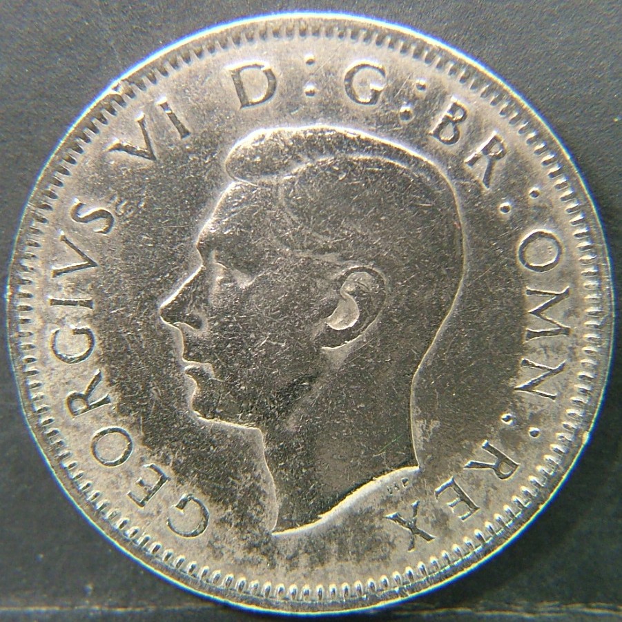 Back side of 🇬🇧 United Kingdom – Monarchs and Milestones 1 Shilling Eng 1948 coin