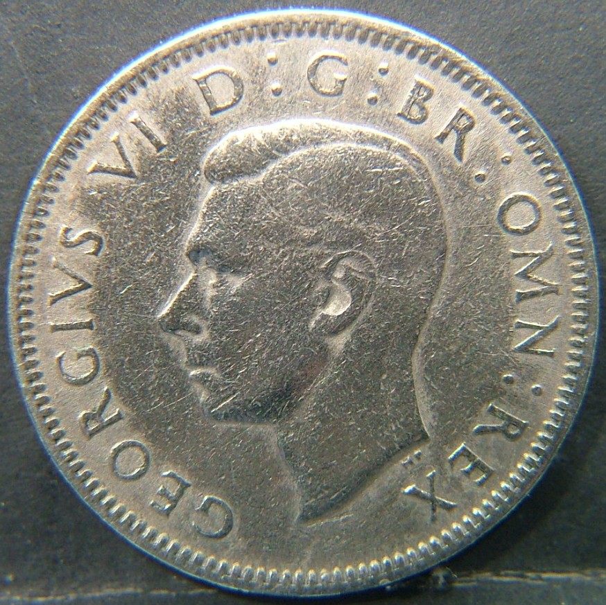 Back side of 🇬🇧 United Kingdom – Monarchs and Milestones 1 Shilling Eng 1948 coin