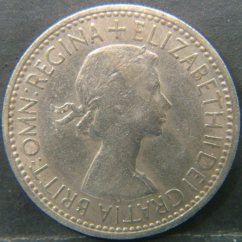 Back side of 🇬🇧 United Kingdom – Monarchs and Milestones 1 Shilling Scot 1953 coin
