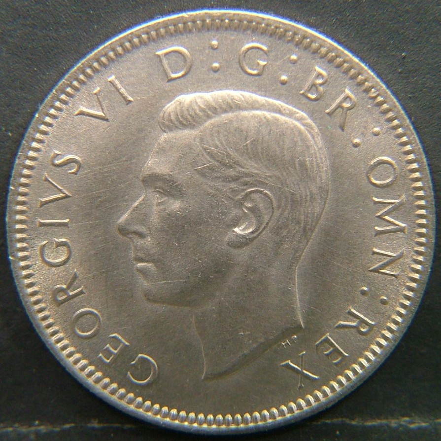 Back side of 🇬🇧 United Kingdom – Monarchs and Milestones 1 Shilling Scot 1948 coin