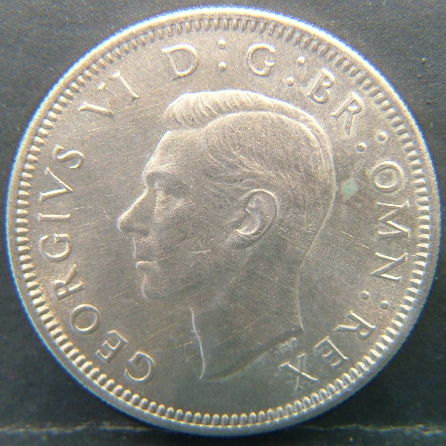 Front side of 🇬🇧 United Kingdom – Monarchs and Milestones 1 Shilling Eng 1951 coin
