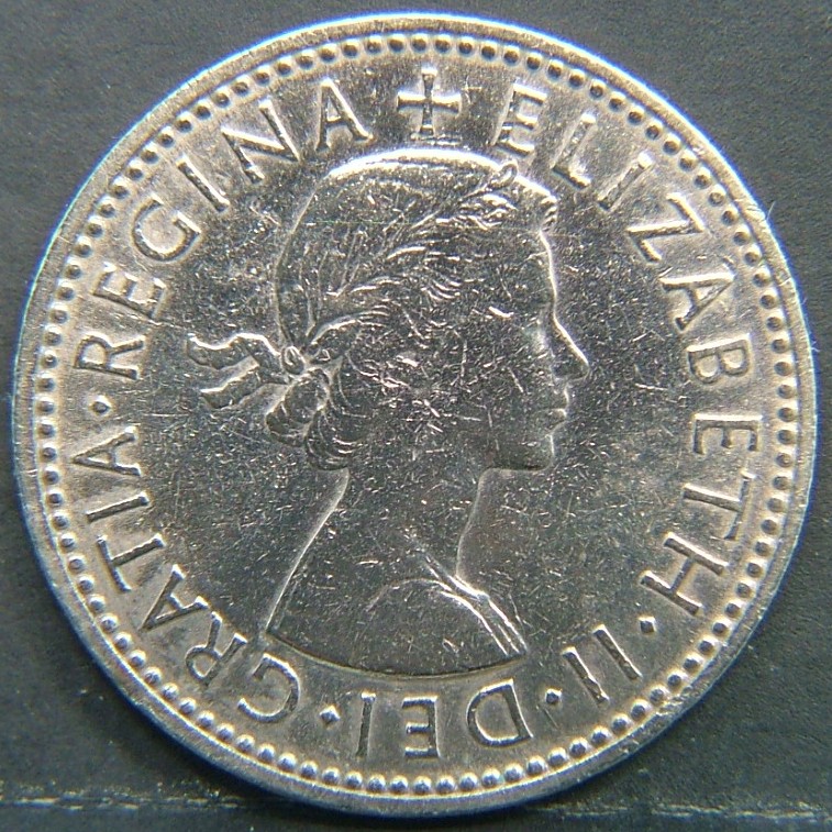 Back side of 🇬🇧 GREAT BRITAIN – Monarchs and Milestones 1 Shilling Eng 1955 coin
