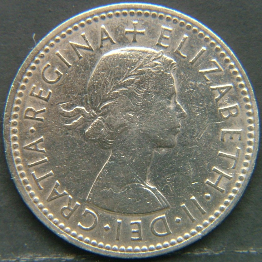 Back side of 🇬🇧 GREAT BRITAIN – Monarchs and Milestones 1 Shilling Eng 1961 coin