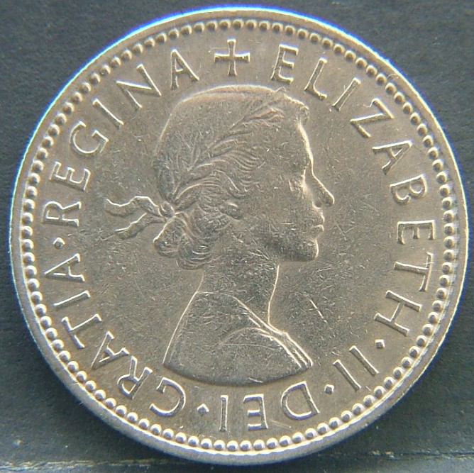 Front side of 🇬🇧 GREAT BRITAIN – Monarchs and Milestones 1 Shilling 1963 coin